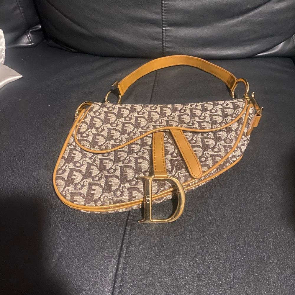 Christian Dior Saddle bag in Brown oblique with gold -notice (damages)in pics.